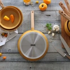 Poêle Ector Induction Aluminium Revêtu Manche En Bois 20 Cm Jaune -Fournitures Cuisine Boutique 108005 2 1 Poele Ector induction aluminium revetu manche en bois 20 cm jaune Ogo
