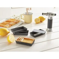 Set De 4 Moules à Tartelettes Avec Fonds Amovibles -Fournitures Cuisine Boutique 541084 4 4 Set de 4 moules a tartelettes avec fonds amovibles Mathon